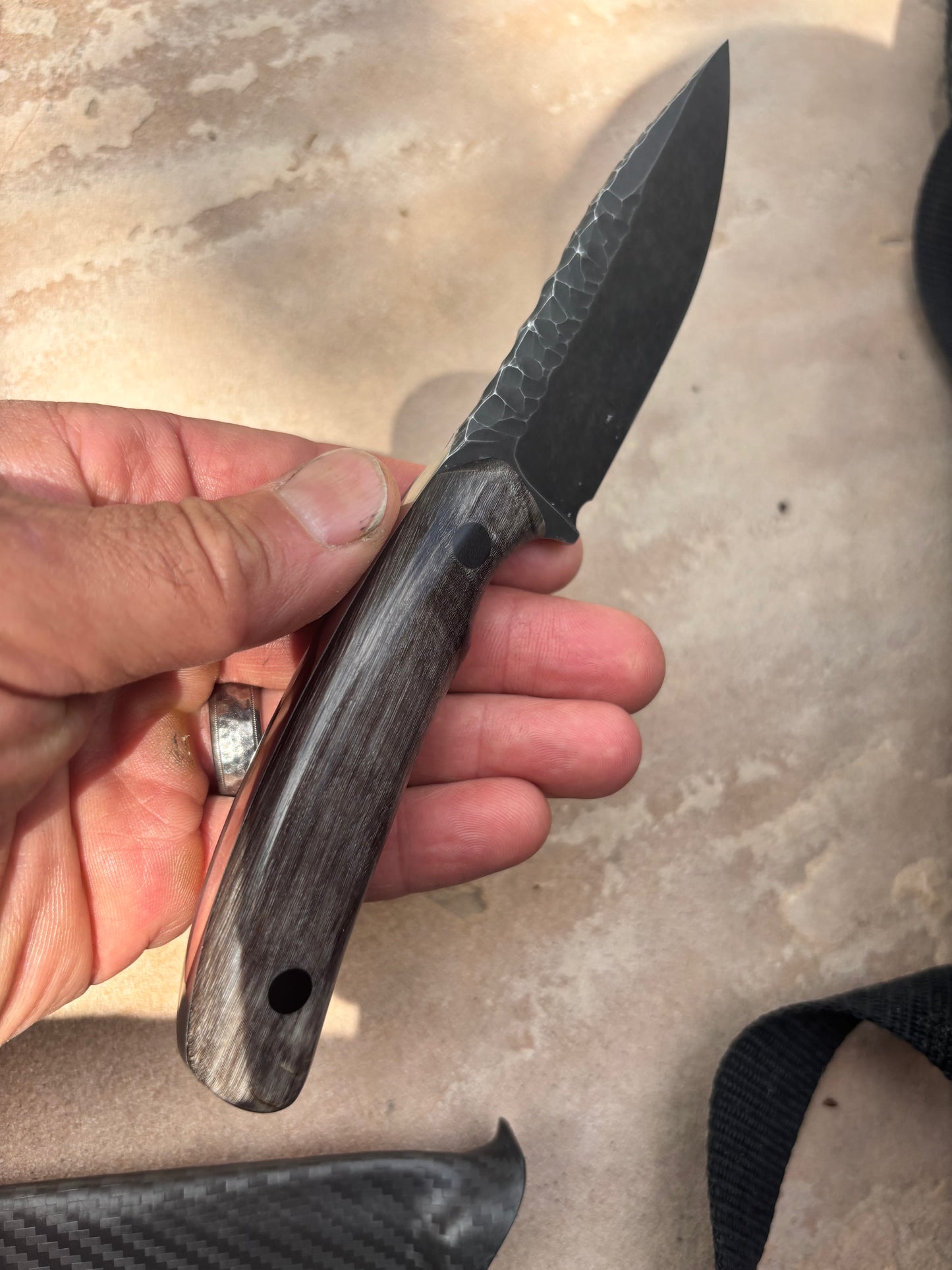 Middle Fork Hunter-OG in 52100 Carbon Steel, Parkerized/Stonewash Finish, Aoudad Scales w/Black Micarta Liners, Micarta Pins